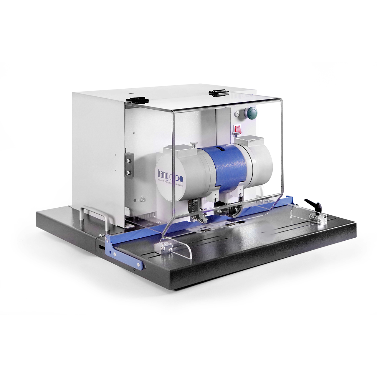 Hang-PiccoStar Öesmaschine Modell-102-60 HANG PiccoStar Modell 102-60 in schräger Vorderansicht mit transparentem Schutzgehäuse, Bedienelementen, blau-weißem Maschinengehäuse, verstellbaren Anschlägen und schwarzer Grundplatte.