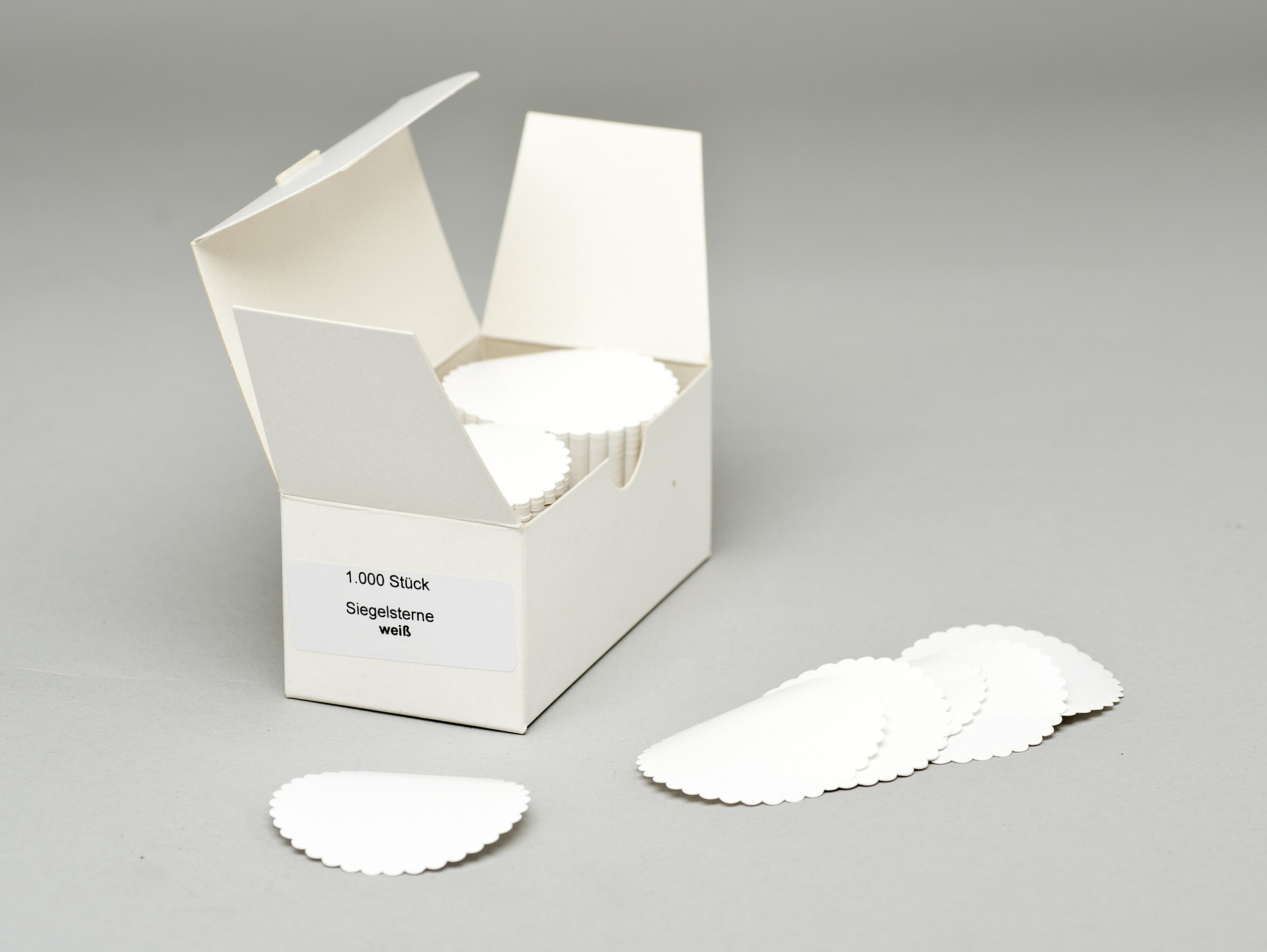 Siegelsterne Weiß nassklebend VE Siegelsterne Weiß nassklebend VE