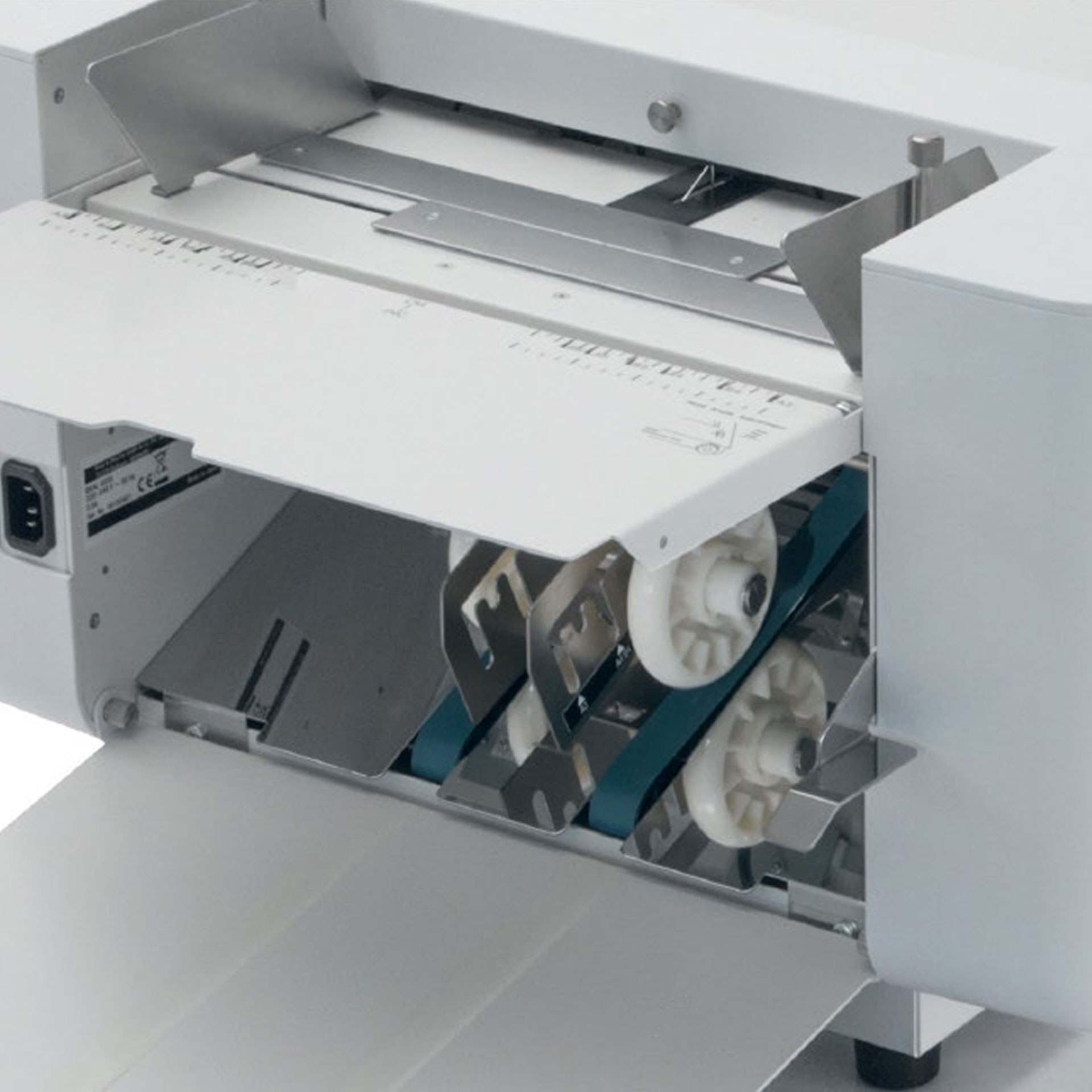 ideal 8335 falzmaschine-bandauslage mit verstellbarer Papierauswurfrolle ideal 8335 falzmaschine-ansicht auf die bandauslage mit verstellbarer Papierauswurfrolle